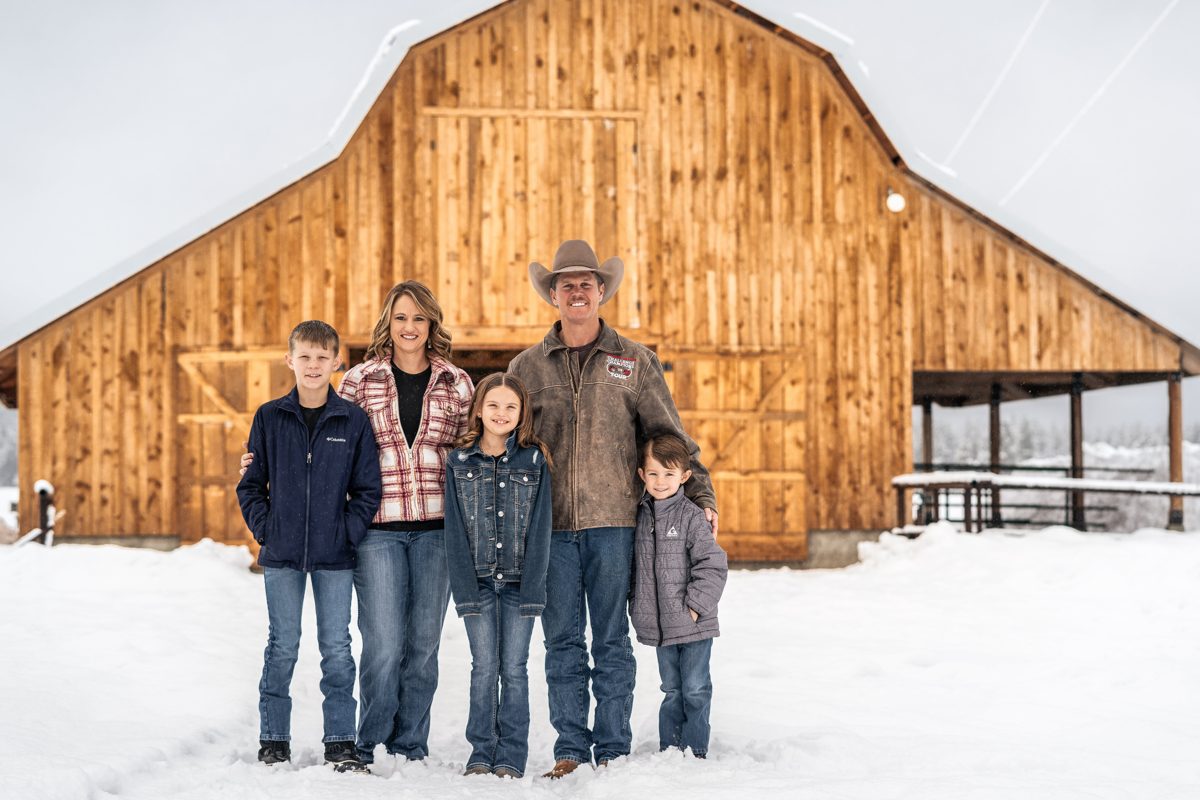 The Johnson family in front of their barn